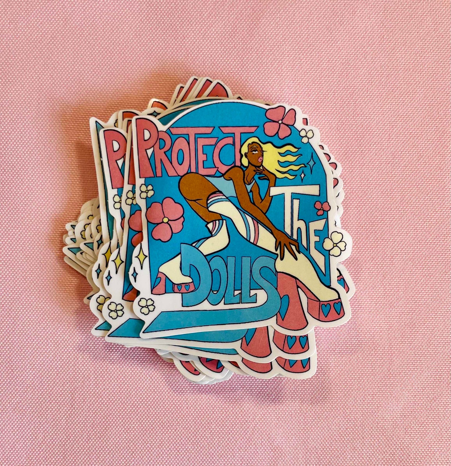 'Protect the dolls' sticker