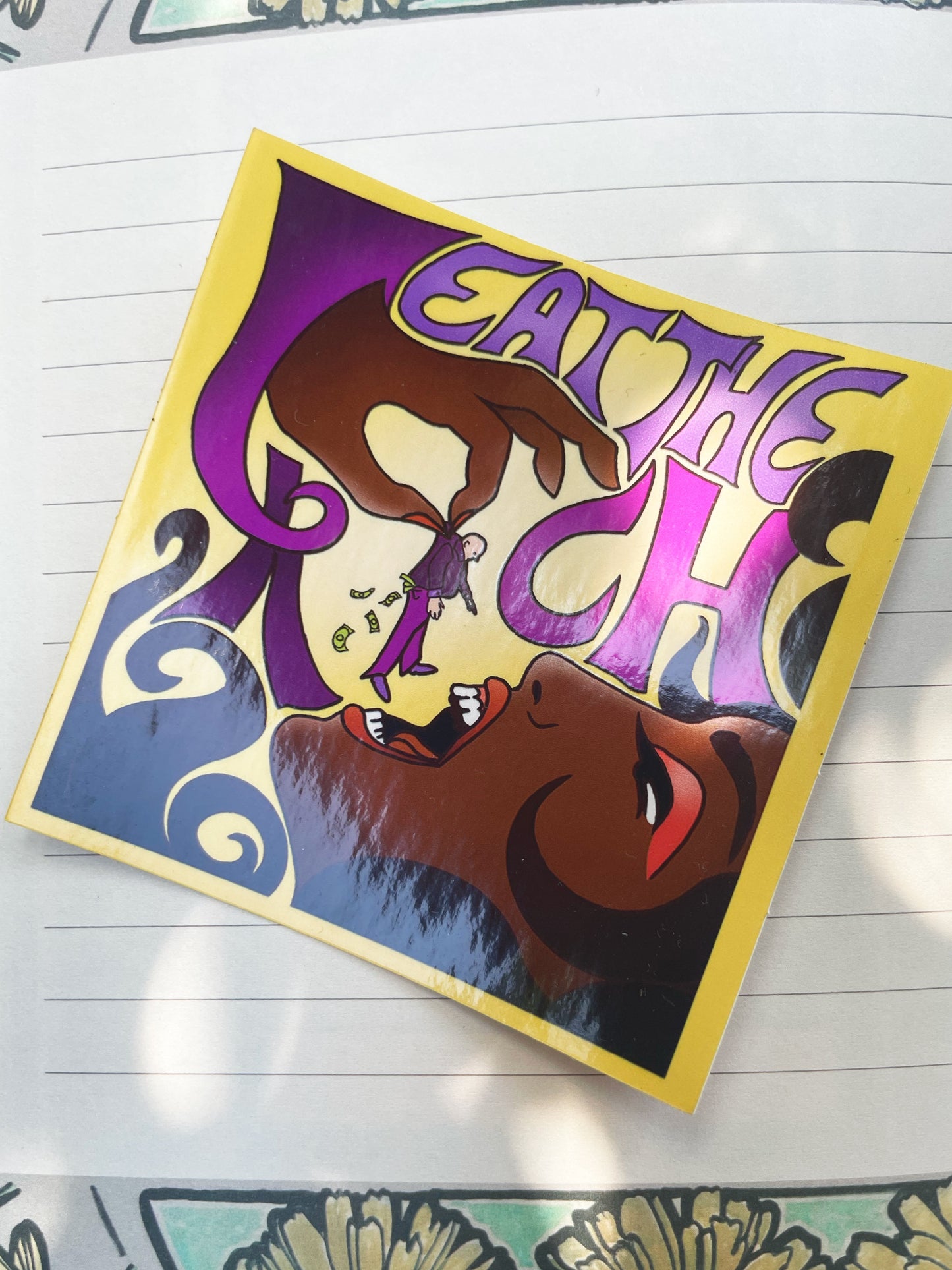 'Eat the rich' sticker