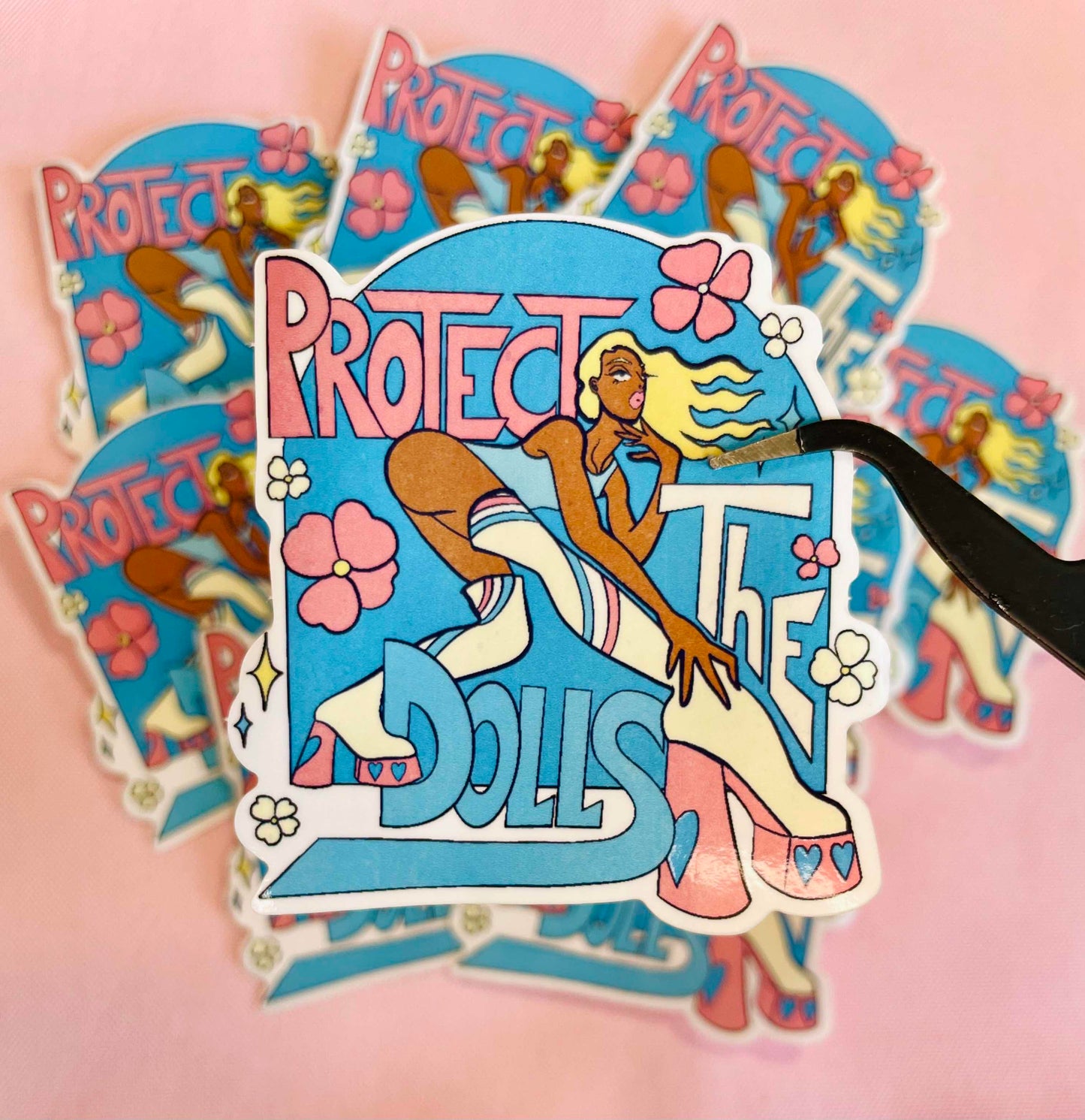 'Protect the dolls' sticker